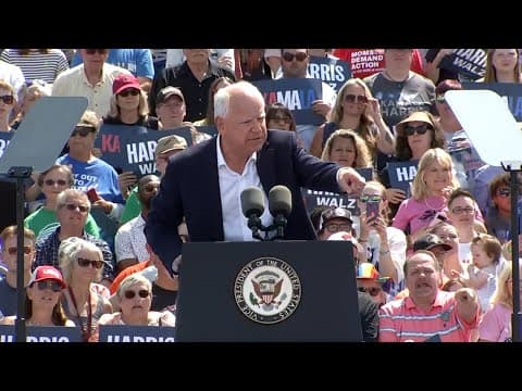 Gov. Tim Walz stops Wisconsin speech to get person water