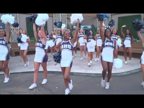 Madison Warhawks Cheer gets ready for Friday night football