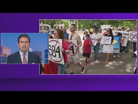 Immigrant rights advocates march in downtown Houston to protest SB4