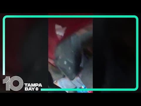 #Florida police officers lift car off man after car jack fails