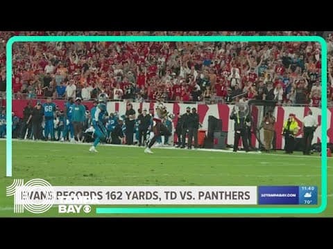 Evans scores on 75-yard TD, tops 1,000 yards for 10th straight year