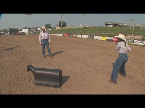 Samie gets ropin' lessons at the Hamel Rodeo