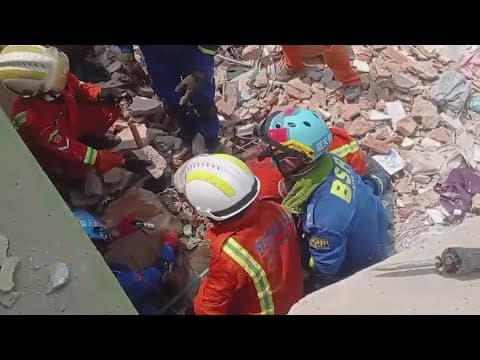 Rescuers continue working after officials confirmed over 3,000 people died in earthquake