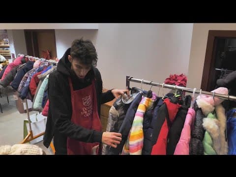 Chet Holmgren hands out coats at Brooklyn Park Salvation Army