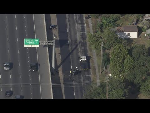 Mustang split in half in crash along Southwest Freeway feeder road