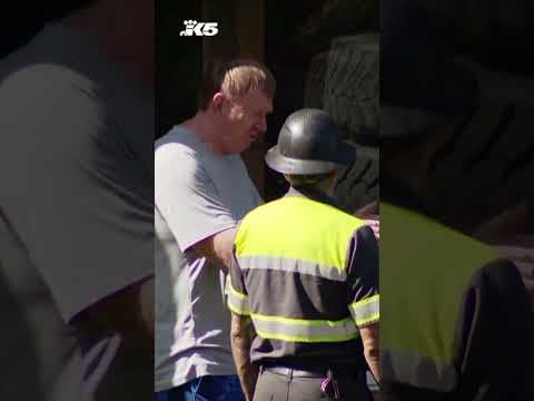 Driver hospitalized after dump truck slams into Edmonds home