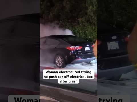 A woman was electrocuted and died after a car crashed into an electrical box