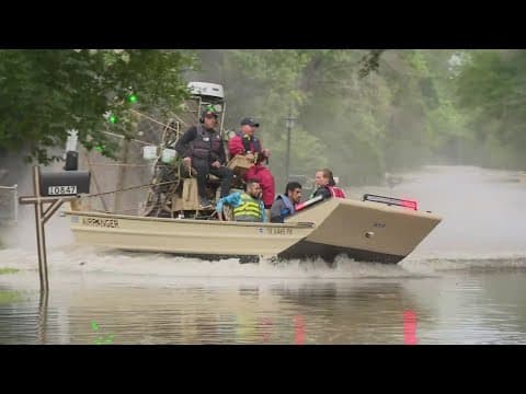 Airboats navigate streets in Montgomery County neighborhood as floodwaters rise