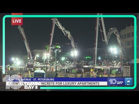 Crews pour cement for luxury apartments in St. Pete