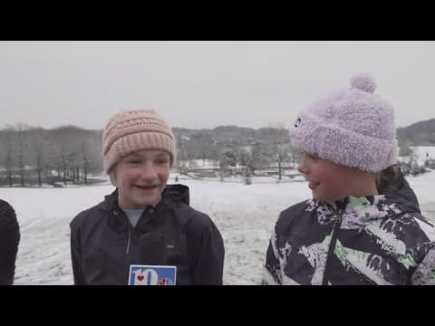 Kids having fun in the snow at Lakeshore Park