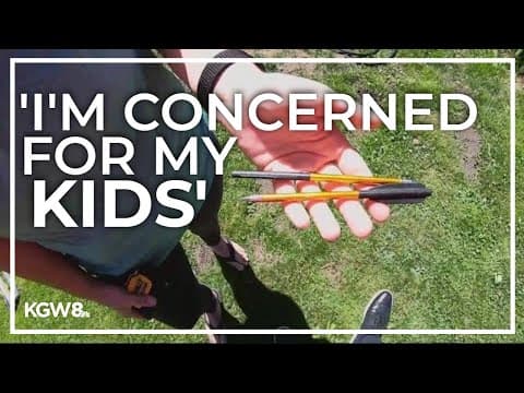 Troutdale mother of two concerned after crossbow darts found in her yard