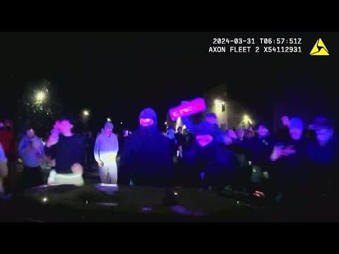 Video shows crowd in 'street takeover' swarming police cruiser in Virginia
