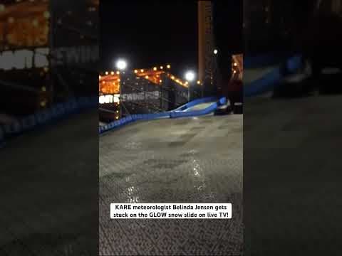 KARE meteorologist Belinda Jensen gets stuck on the GLOW snow slide on live TV!