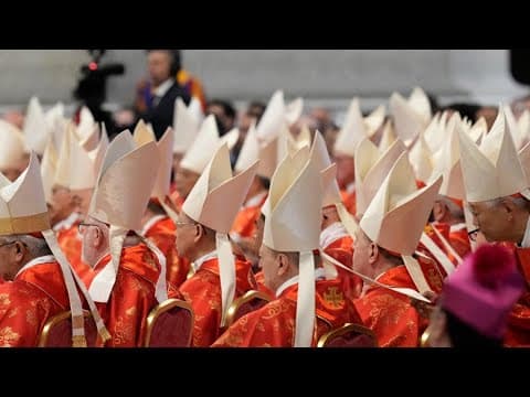 The conclave to elect a new pope officially begins as the door to the Sistine Chapel closes