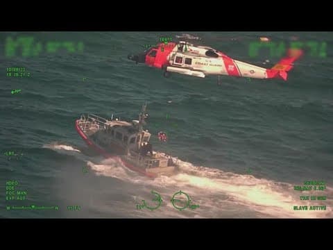 New details in Coast Guard rescue of boaters from shark-infested waters