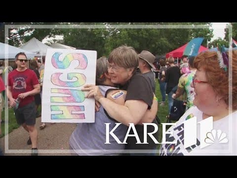Parents give 'free mom hugs' at Twin Cities Pride