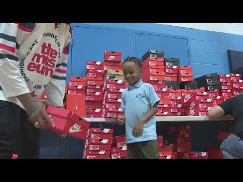 Billionaire kicks it with the Boys and Girls Club of the Greater Washington and hands out sneakers