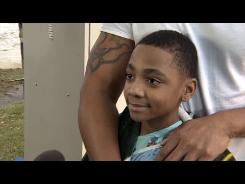 11-year-old boy describes punching through window to escape apartment fire