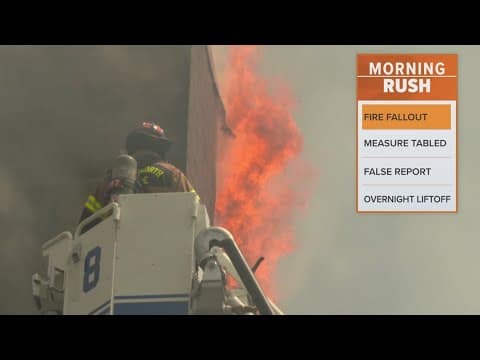 Residents react after a fire displaces over 800 people