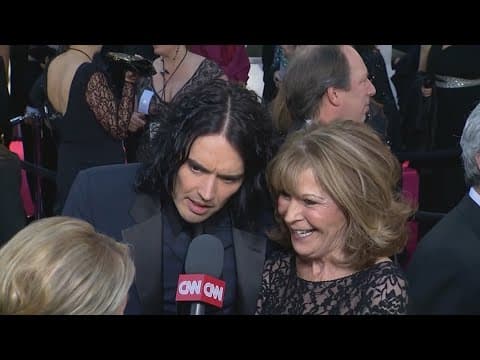 Comedian Russell Brand charged with rape and sexual assault in London