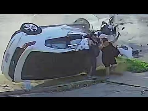 SHOCKING VIDEO: Car rolls over pedestrians after crash, they walk away alive