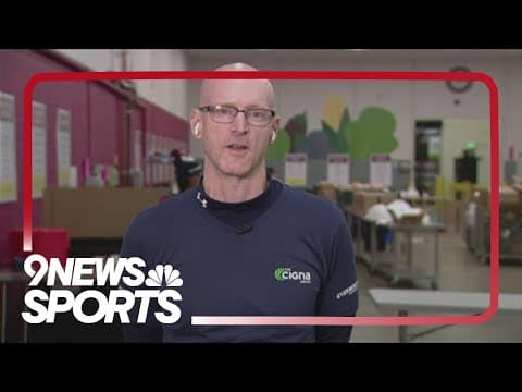 Broncos players join Cigna Healthcare to volunteer at Food Bank of the Rockies