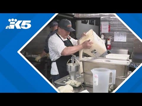 Volunteers prepare holiday meals for the homeless