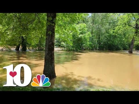 Little Pigeon River runs over and floods Sevierville City Park