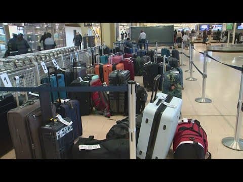 Dozens of passengers searching for luggage lost at DCA during snowstorm