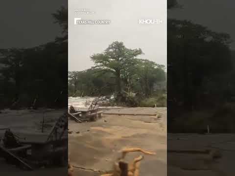 Camps Mystic campers sing as they're evacuated from flooding
