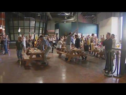 Padres fans at home cheer for the final game against Mets