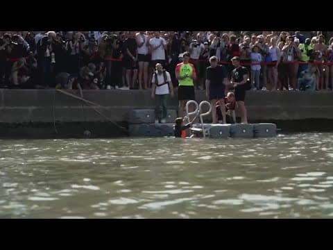 Paris Mayor swims in Seine to show it's safe ahead of Olympic events