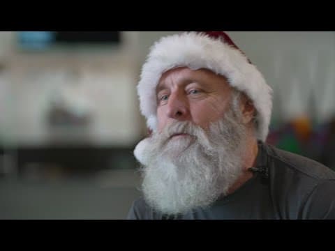 Fit Santa works off his milk and cookies in the gym and gives back