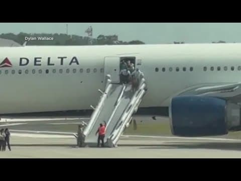 Delta plane catches fire at Orlando airport