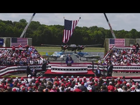 Trump behind bulletproof glass at outdoor rally in North Carolina