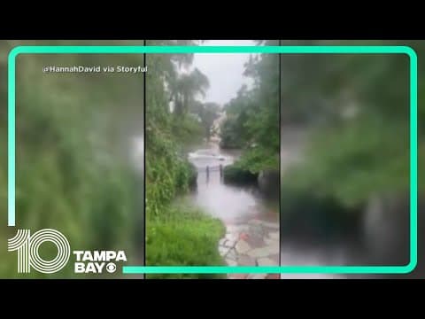 Car drifts through flooding in Rhode Island