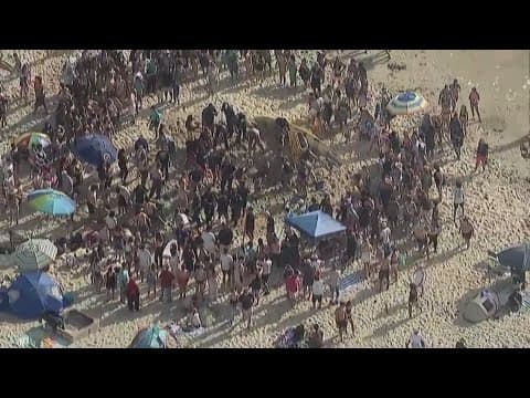 San Diego lifeguards rescue girl trapped under sand at Mission Beach