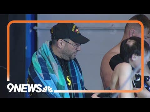 Veterans go to Denver Aquarium for shark cage diving