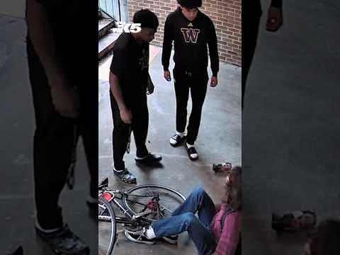 New video shows two former UW players attacking cyclist