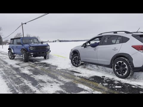 Lawrence firefighters helps get 13News crew out of snow bank