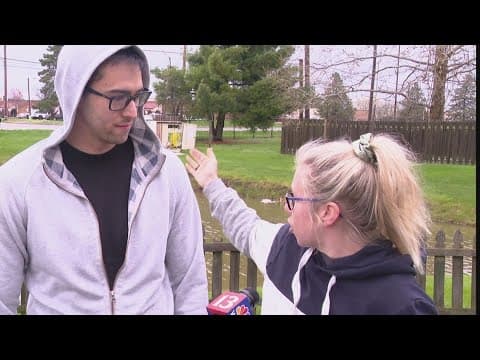 Driver rescued after driving car into pond