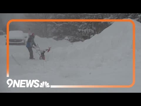 Snow falls in Colorado mountains of Summit County
