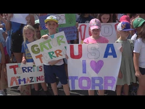 Olympian Torri Huske welcomed home in Arlington