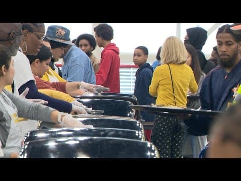 Super Feast volunteers serve Thanksgiving meals, clothing and toys to hundreds of Houstonians