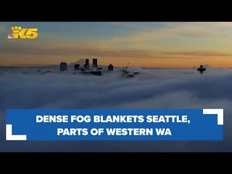 Dense fog rolls into western Washington, covering Seattle on Dec. 20