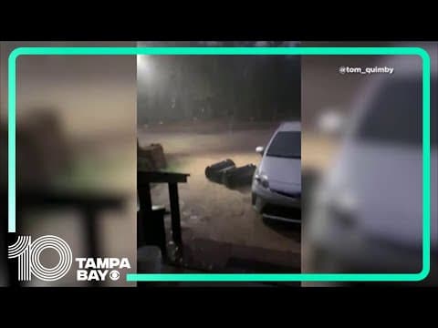 Hail pours down onto car as severe weather leaves damage throughout Florida Panhandle
