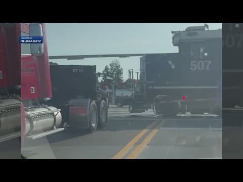 Train crashes into a stalled semi truck in Florida