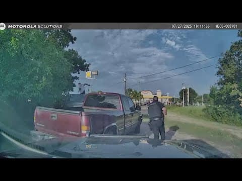Dashcam video shows a man trying to steal a police squad car