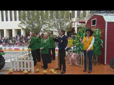 Rodeo Houston education floats roll down the downtown Houston streets