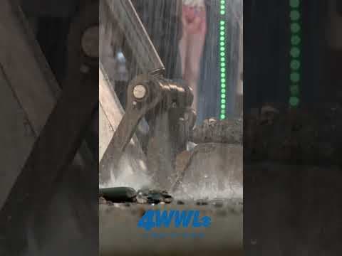 Water bursts from manhole at Royal and Canal Street in New Orleans